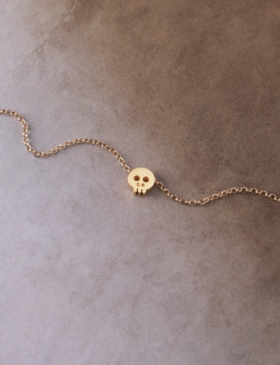 Tiny skull bracelet clearance