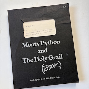 May include: A rustic wooden sign with the text "Welcome to our home" in white lettering. The sign features a distressed finish and a simple, inviting design, perfect for a front porch or entryway.