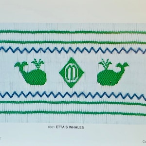 May include: A needlepoint pattern featuring green whales and a central diamond shape with a monogram. The design includes blue and green zigzag and straight lines on a white background. The text "ETTA'S WHALES" is visible.
