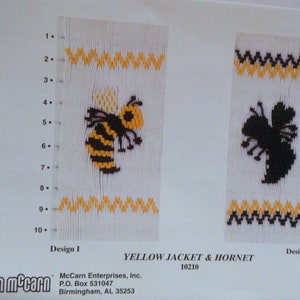 May include: A craft pattern featuring two designs: a yellow and black bee and a black hornet. The designs are on a white background with yellow zigzag borders. The text "YELLOW JACKET & HORNET" is visible.