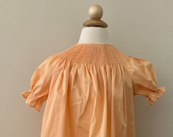 Heirloom Batiste Peach Ready to Smock Bishop. Sz: 2- 3 Beautiful soft fabric and beautiful color.