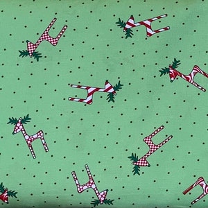 Reindeer Print on Green 60&quot; Sold: BTY CLASSICS CHRISTMAS  by Fabric Finders So many ideas so let your imagination go and create