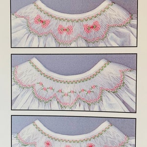 May include: A page titled "Bishop Trinity" displays three examples of a white garment neckline with pink and green embroidery. The text "COPYRIGHT USA © CROSSEYED CRICKET, 2013 Plate #309" is at the bottom.