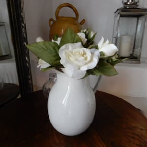 white pitcher in very old enameled sheet metal only for old France decoration