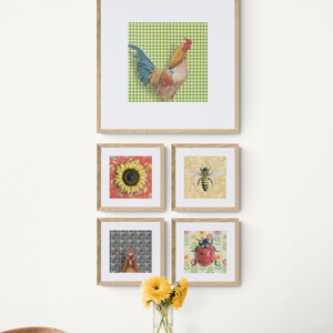 May include: Five framed prints with different animal and floral designs. The prints are arranged in a grid pattern on a white wall. The top print features a rooster on a green and white checkered background. The other prints feature a sunflower, a bee, a hen, and a ladybug.