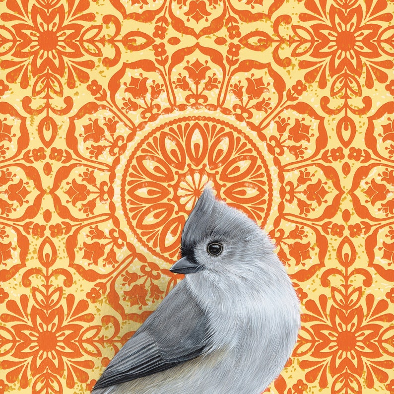 May include: A gray and white tufted titmouse perched on a background of orange and yellow mandala pattern.