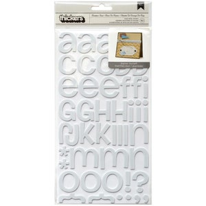 May include: A package of white foam letter stickers. The package includes the letters of the alphabet, numbers, and punctuation marks. The brand name "thickers" is visible at the top. The text "Express Yourself!" is also visible.