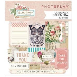 May include: Cardstock ephemera set with a vintage aesthetic. Includes various paper cutouts with floral and butterfly illustrations, text that reads "Beautiful Junque", "Flea Market", "Thank You", and "Take the Photo".