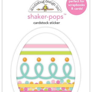 May include: A white cardstock sticker with a colorful Easter egg design. The egg is decorated with pink, yellow, green, and blue stripes and dots. The sticker says "shaker-pops™ cardstock sticker" and "perfect for scrapbooks & cards!"