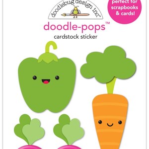 May include: A set of four cardstock stickers featuring cartoon vegetables with happy faces. The stickers include a green bell pepper, a carrot with green leafy tops, and two pink radishes with green tops.