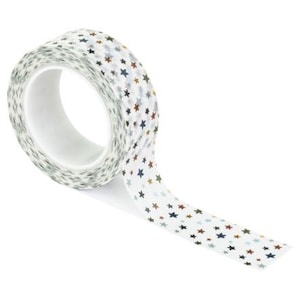 May include: A roll of decorative washi tape with a white background and a pattern of small, colorful stars in shades of blue, brown, and gold. The tape is partially unrolled, showing the pattern.