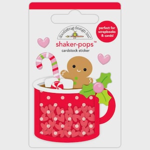 May include: A Doodlebug Design Inc. shaker-pops cardstock sticker featuring a red mug with white polka dots and heart patterns, a gingerbread person, a candy cane, white marshmallows, a red and white peppermint, and green holly leaves.