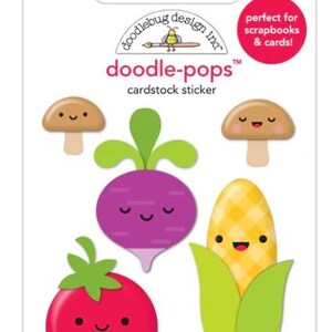 May include: Cardstock stickers featuring cute cartoon vegetables and mushrooms. The stickers include a red tomato, a purple radish, a yellow corn, and two brown mushrooms. The packaging includes the text "doodle-pops" and "cardstock sticker".