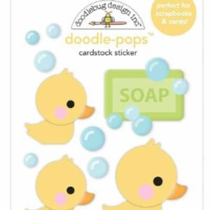May include: Doodle-pops cardstock sticker sheet featuring yellow ducklings, blue bubbles, and a green soap graphic. The sticker sheet includes the text "doodle-pops" and "SOAP".