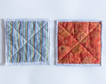 orange flowers quilted potholders