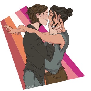 May include: Illustration of two people embracing and kissing, set against a lesbian pride flag. One person wears a black shirt and gray pants, the other a gray shirt and brown pants. The artwork has a clean, modern style.