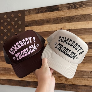 Somebody’s Problem Trucker Hat