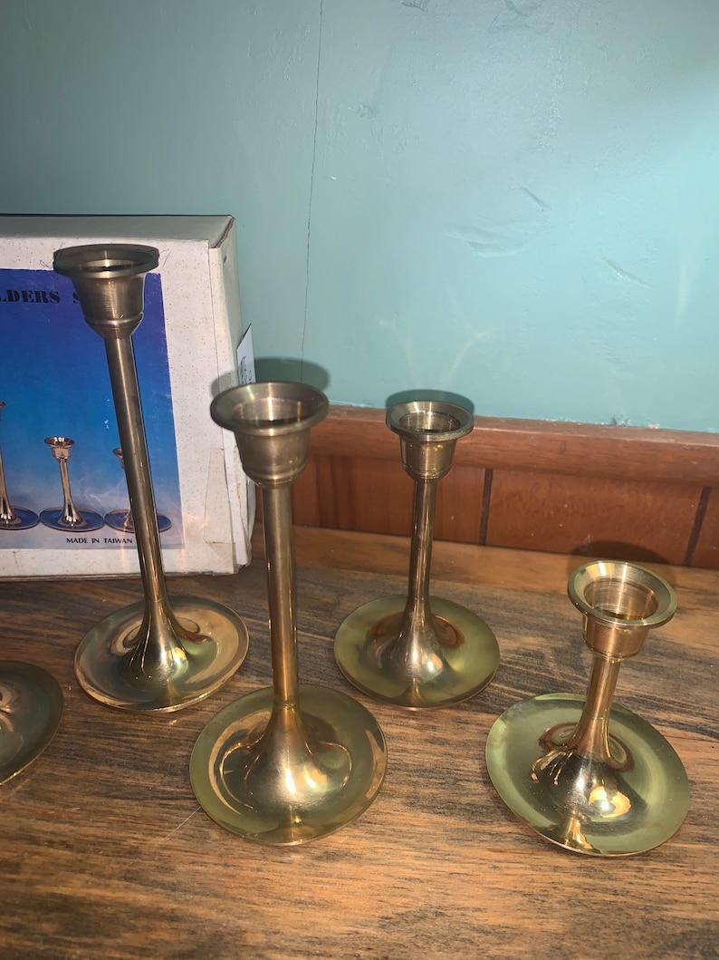 Brass Candlestick Holders Graduated Height Set of Seven