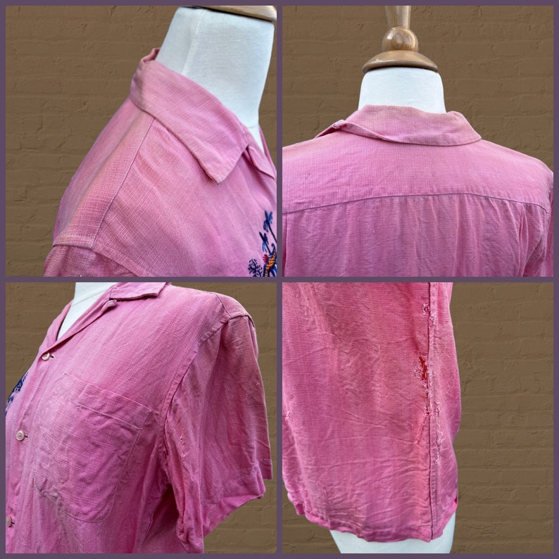 May include: A pink short-sleeved button-down shirt with an embroidered design on the front. The shirt has a collar and a pocket on the left side.