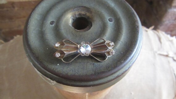 1950s rivoli rhinestone gold bow brooch