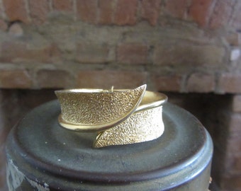 1950s Crown Trifari textured gold clamper bracelet