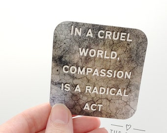 In a cruel world, compassion is a radical act sticker