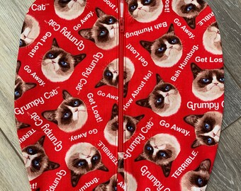 Grumpy cat catheter bag cover fits 2000ml urine collection systems. Easy zip closure, weighted open hem. Confident in public