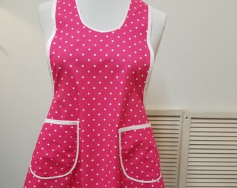 Polka dots on hot pink, new apron reproduced from Retro WWII, fits bust 38-44.