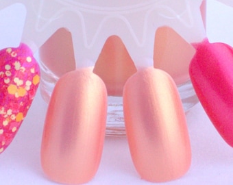 Peach Shimmer Nail Polish with Warm Pink and Gold Glow
