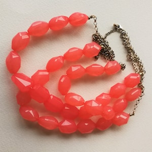 Necklace - striking multi strand pink plastic bead necklace plastic beads