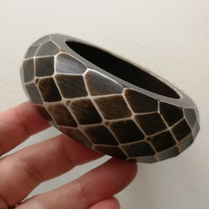 Chunky funky brown and cream carved plastic bangle retro design