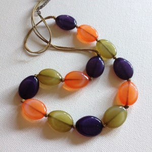 Necklace - sage green orange and brown transparent plastic pebble bead necklace