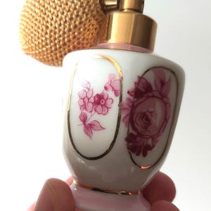 vintage china perfume atomizer features a floral porcelain design produced in Japan