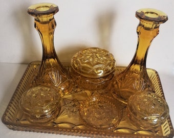 Vintage golden amber depression glass art deco dressing table - tray, 2 candle sticks , 2 small 1 large trinket lidded powder pots, pin dish