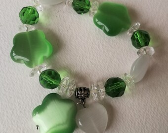 Bracelet-  in green and pale lime green  and clear beads