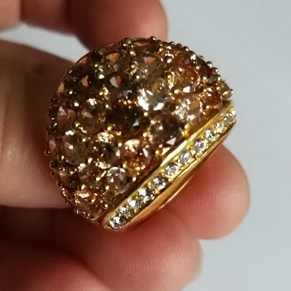 Ring with gold tone metal and clear stones costume jewellery