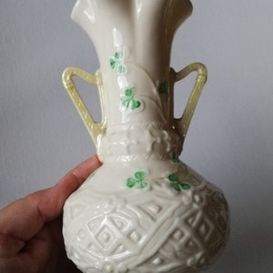 Vintage Belleek Irish porcelain vase with hand painted green clover design great addition to a collection green back stamp