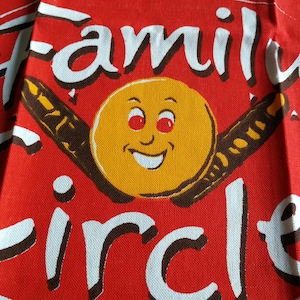 Vintage unused Family Circle biscuits advertising tea towel featuring a smiling biscuit great gift!