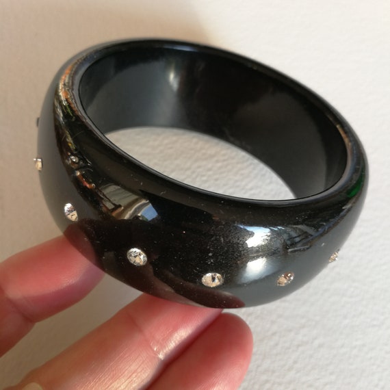 Bangle funky black plastic bangle with diamante inclusions