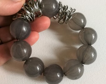 Bracelet  - pretty chunky large plastic beaded elasticated bracelet translucent grey beads