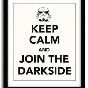 May include: Framed poster with a black border featuring a Stormtrooper helmet graphic above the text "KEEP CALM AND JOIN THE DARKSIDE" in bold black letters on a white background.