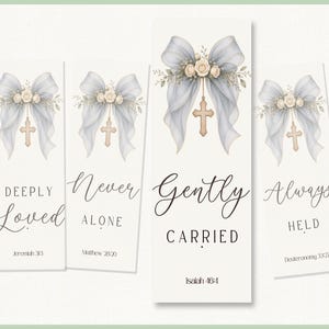 Puede incluir: Cuatro marcadores blancos con ilustraciones en acuarela. Cada marcador presenta un lazo azul claro con detalles florales y una cruz dorada. Los marcadores tienen las palabras "Deeply Loved", "Never Alone", "Gently Carried" y "Always Held".