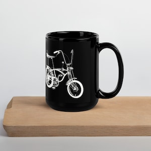 White cotton on Black Glossy Mug 11oz or 15 oz available. These bikes symbolize fun, and this mug is the blend of nostalgia and caffeine!