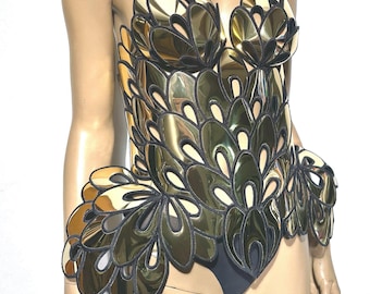 Chrome art nouveau inspired corset , burlesque performer futuristic gear
