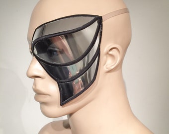 cyborg eye patch designed by Divamp ,futuristic, goggles ,sci fi, cyber eyewear, mask, goggles