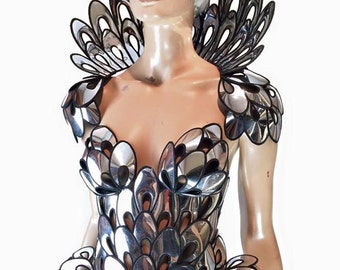 Chrome art nouveau inspired corset , burlesque performer futuristic gear