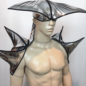 Manta ray shoulder pads, chrome spiked backpiece, dragon vest