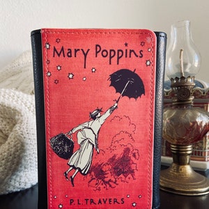 Cartera de mano de piel sintética con dos pliegues y diseño de Mary Poppins