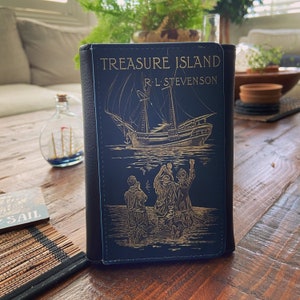 Cartera de mano de piel sintética plegable Treasure Island