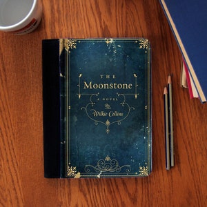 The Moonstone Old Book Cover Notebook Journal Suede Canvas Cute!
